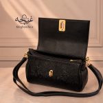 داخل کیف مجلسی زنانه مدل غنچه ورنی