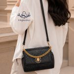کیف مجلسی زنانه مدل غنچه ورنی دو بند بر روی دوش مدل